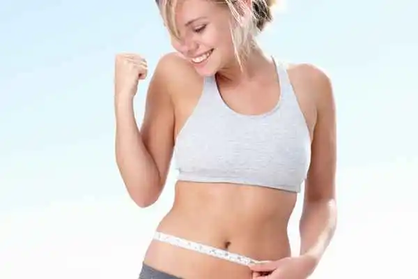 woman happy after fat reduction treatment Telford
