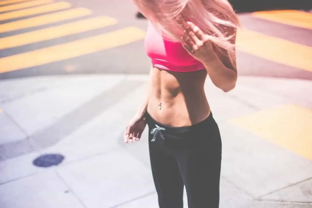 Woman with toned stomach after LA-EMS Body Sculpting Treatment Telford